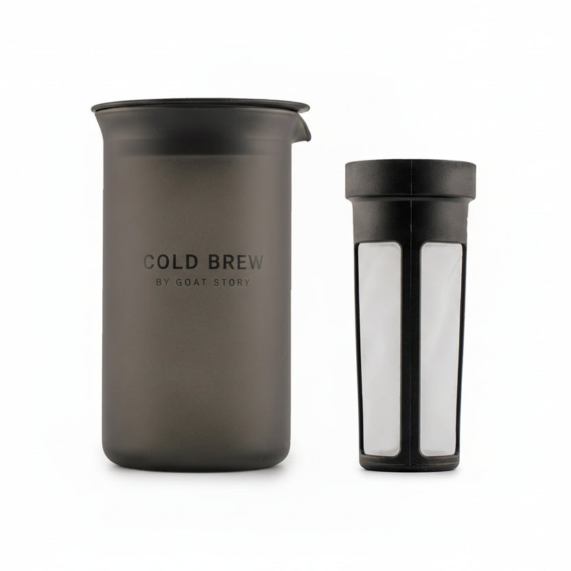 Cold brew coffee maker with a glass carafe on a white background