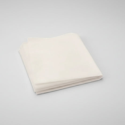 Folded white fabric on a white background
