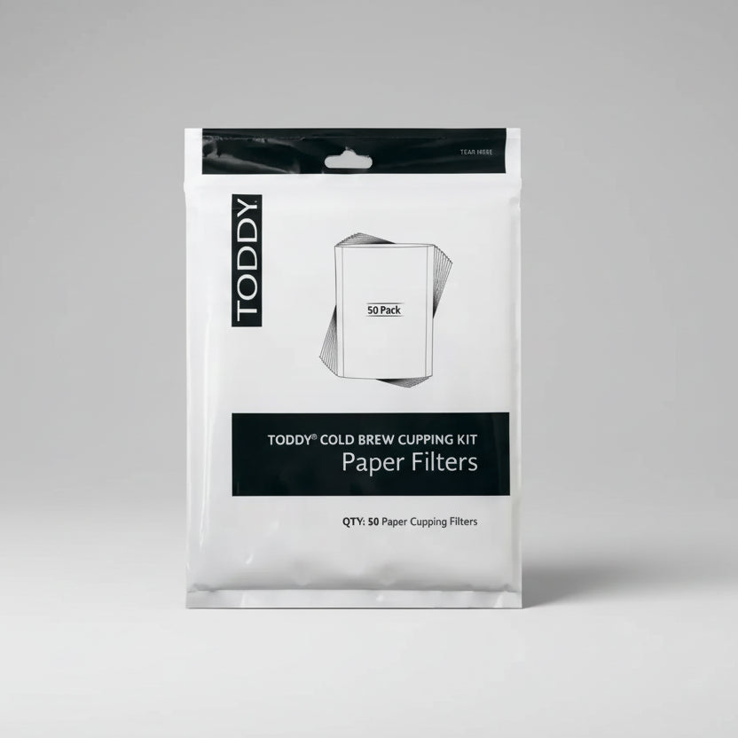 Package of Toddy paper filters for cold brew cupping kit on a white background