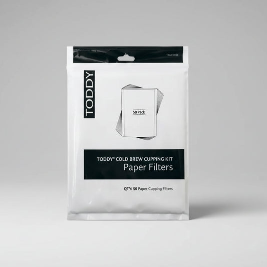 Package of Toddy paper filters for cold brew cupping kit on a white background