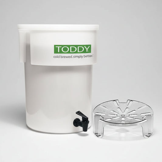 White Toddy cold brew coffee maker with a black spout on a white background